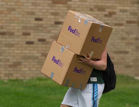 Student Carrying Boxes