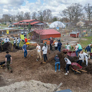 Notre Dame students plant lettuce at Unity Gardens in South Bend