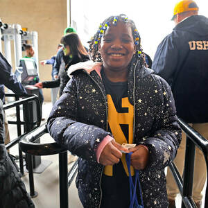 Students from two South Bend Empowerment Zone, (SBEZ) schools (Coquillard and Wilson) enter Notre Dame Stadium for the 2024 Blue-Gold Game.