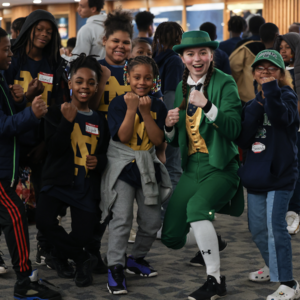 Students met Notre Dame's leprechaun before the Blue Gold game.